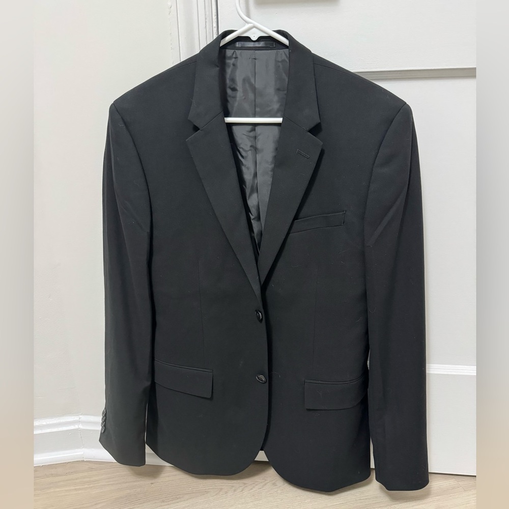 3-piece H&M black suit, vest, slacks. Never worn. 38R and 32 waist.